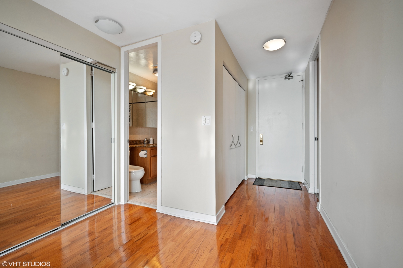 655 West Irving Park Road, Unit 4005 Chicago, IL 60613 - Photo 8 of 12 a view of hallway with wooden floor