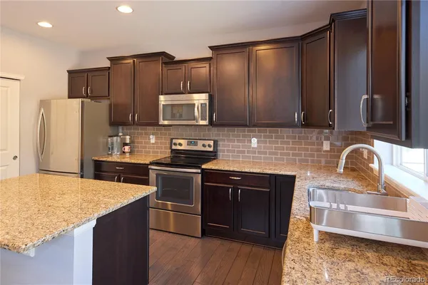 a bedroom with a bed and bathroom