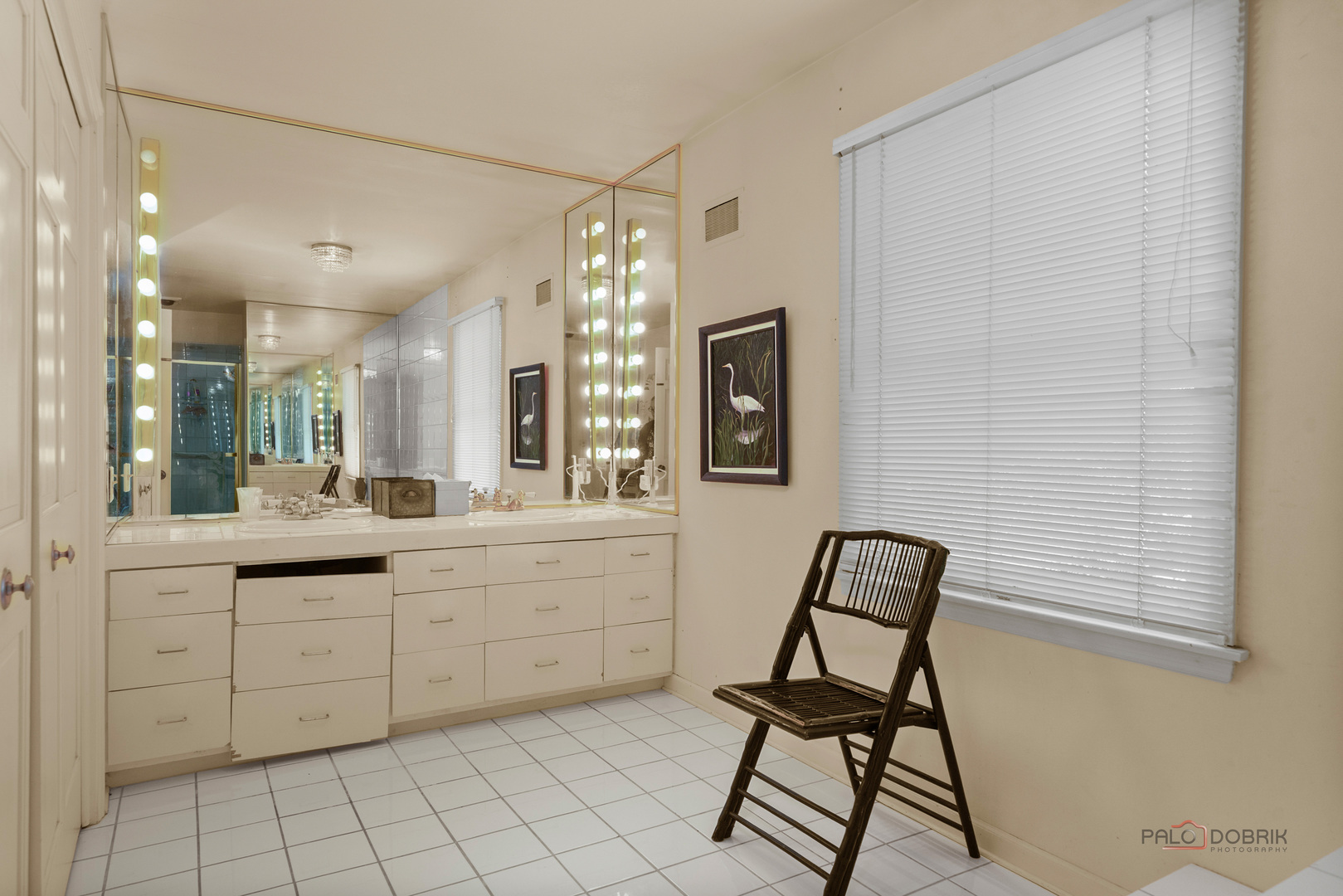 37 Forest Hills Road Lake Bluff, IL 60044 - Photo 27 of 52 a spacious bathroom with a mirror and a sink