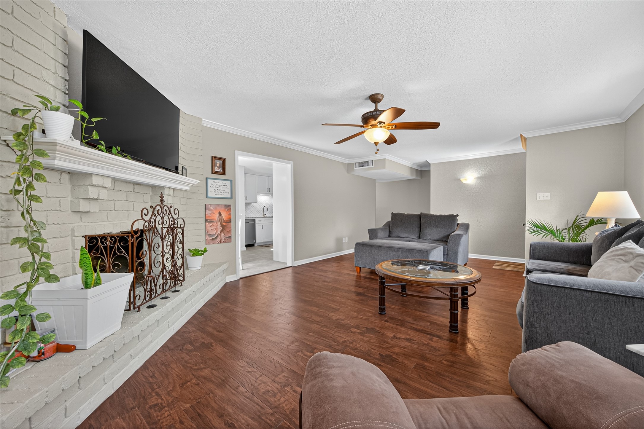 22815 Thadd's Trail Spring, TX 77373 - Photo 13 of 48 a living room with furniture and a flat screen tv