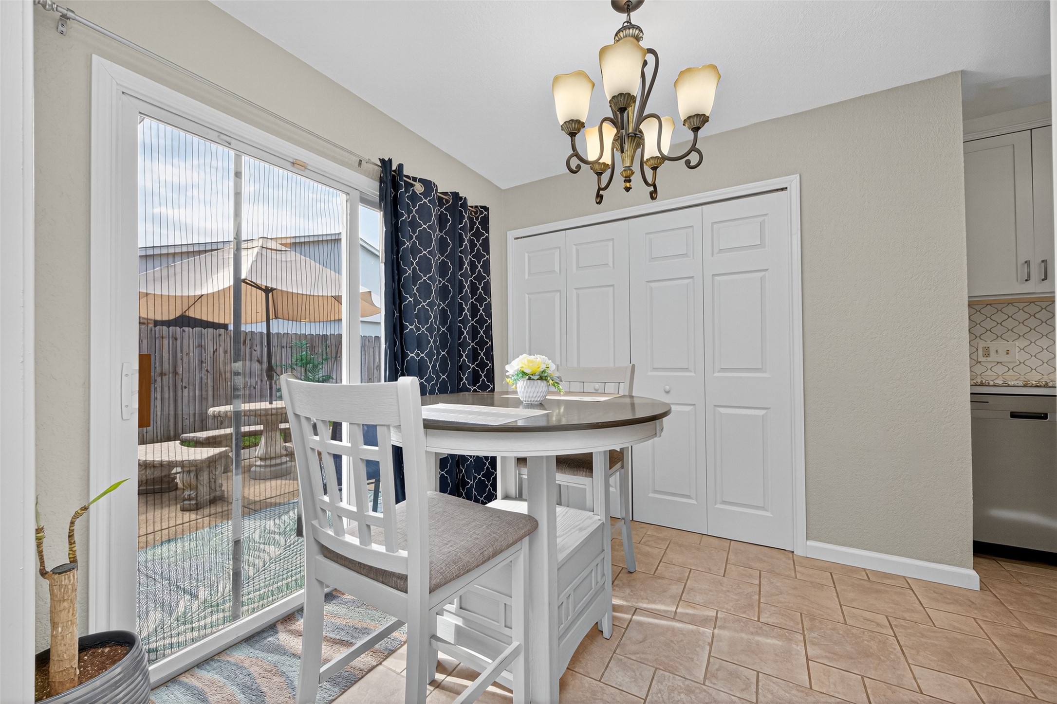 22815 Thadd's Trail Spring, TX 77373 - Photo 17 of 48 a view of a dining room with furniture wooden floor and chandelier