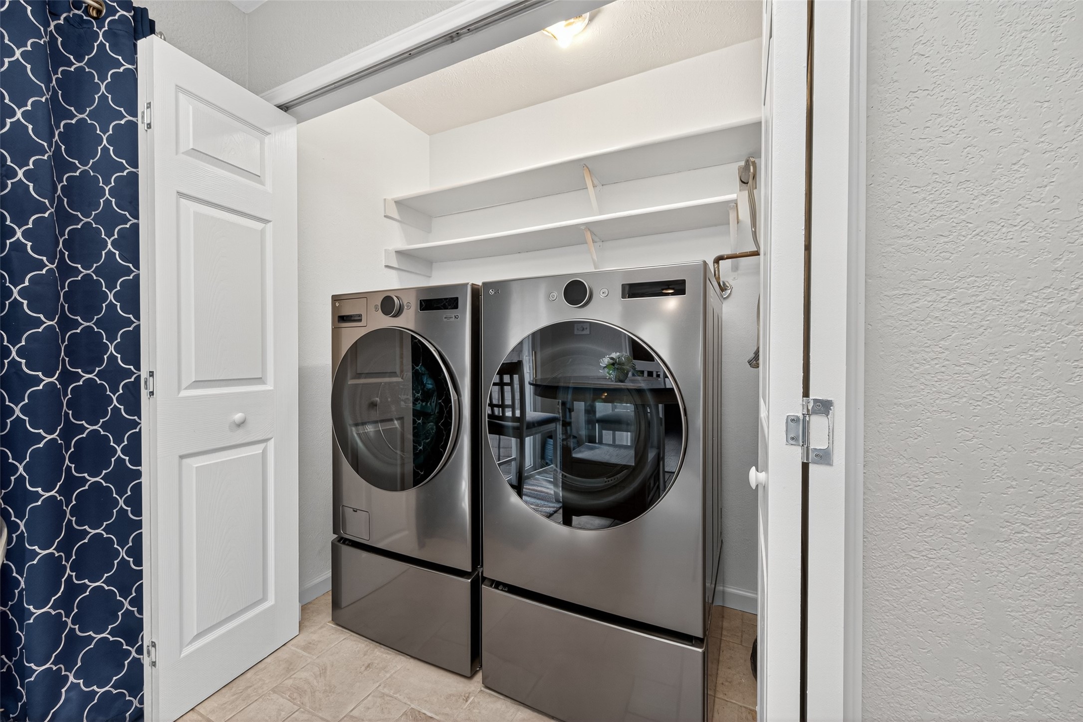 22815 Thadd's Trail Spring, TX 77373 - Photo 19 of 48 a utility room with dryer and washer