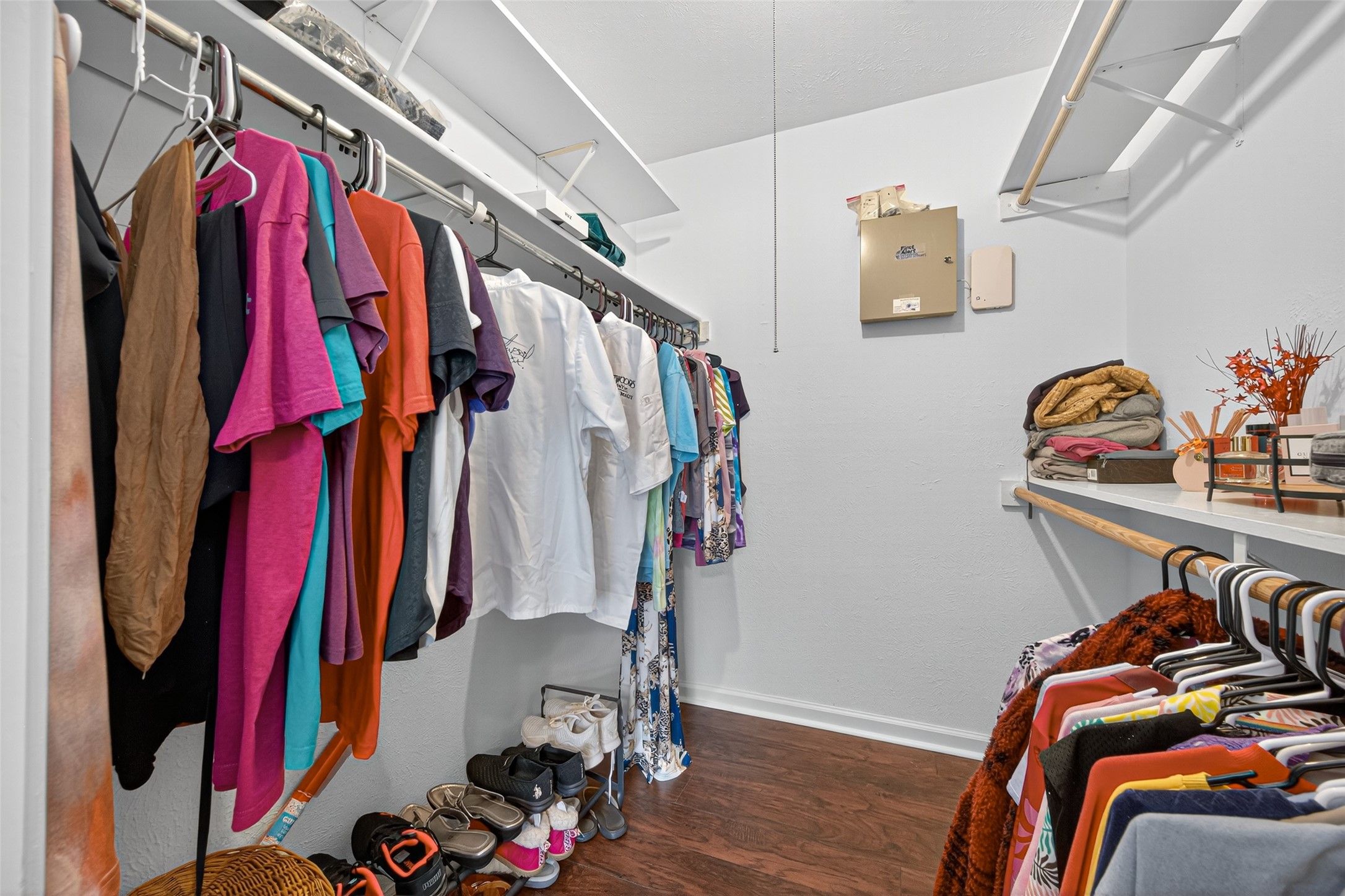 22815 Thadd's Trail Spring, TX 77373 - Photo 36 of 48 a view of walk in closet with clothes and shoes