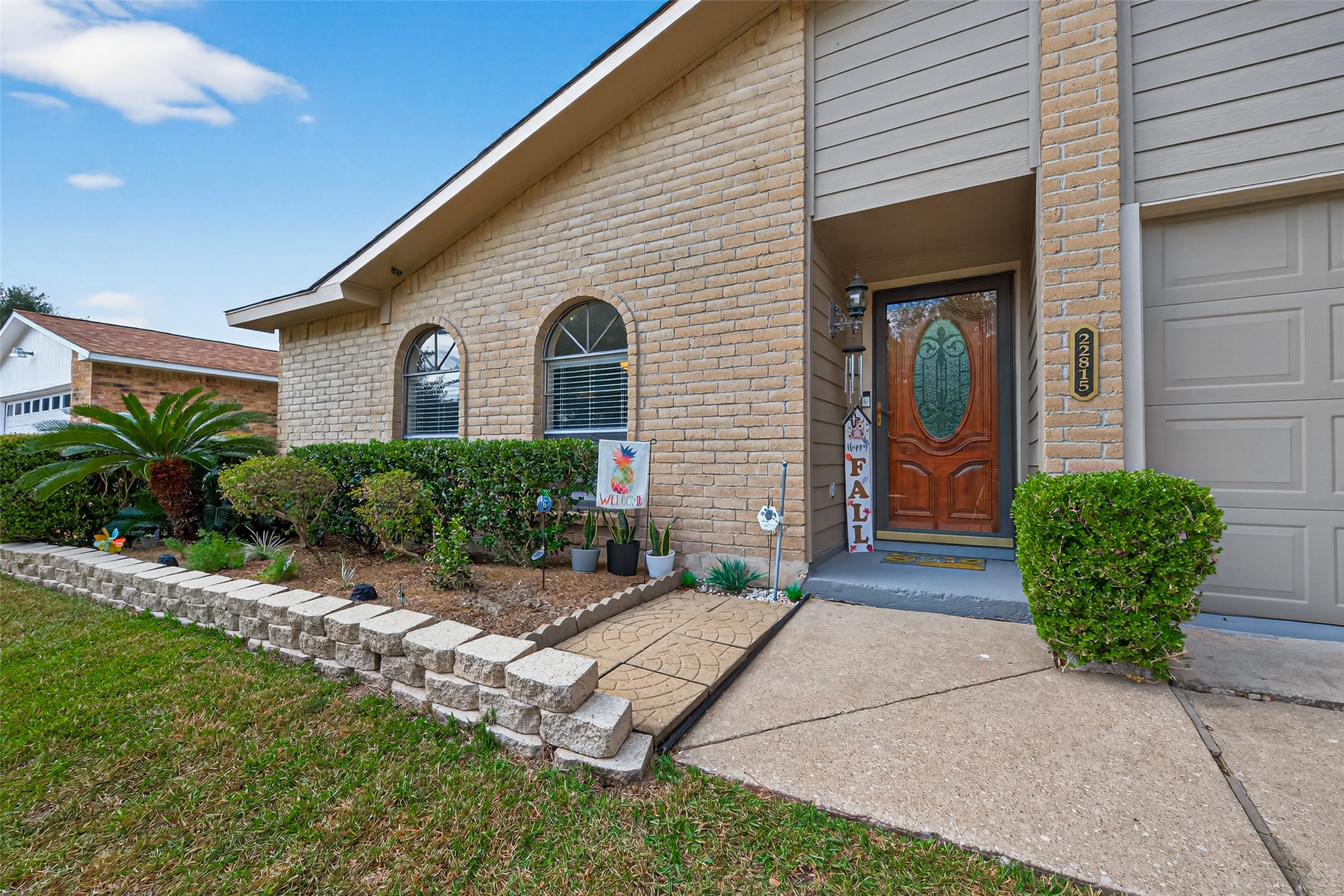22815 Thadd's Trail Spring, TX 77373 - Photo 8 of 48 a front view of a house with garden