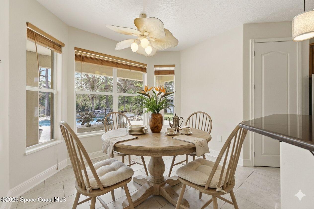 2300 Duncil Lane Malabar, FL 32950 - Photo 19 of 86 a dining room with furniture and window