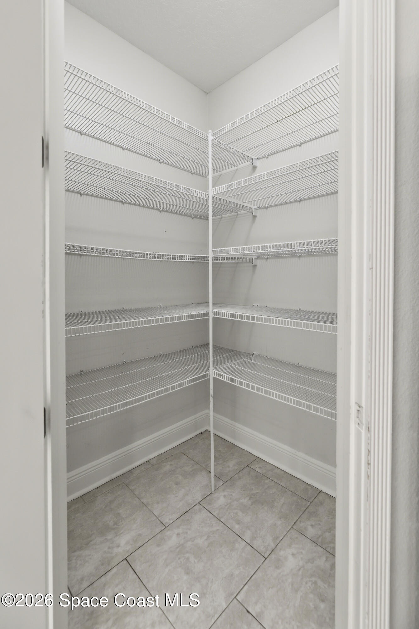 2300 Duncil Lane Malabar, FL 32950 - Photo 27 of 86 a view of walk in closet with empty racks