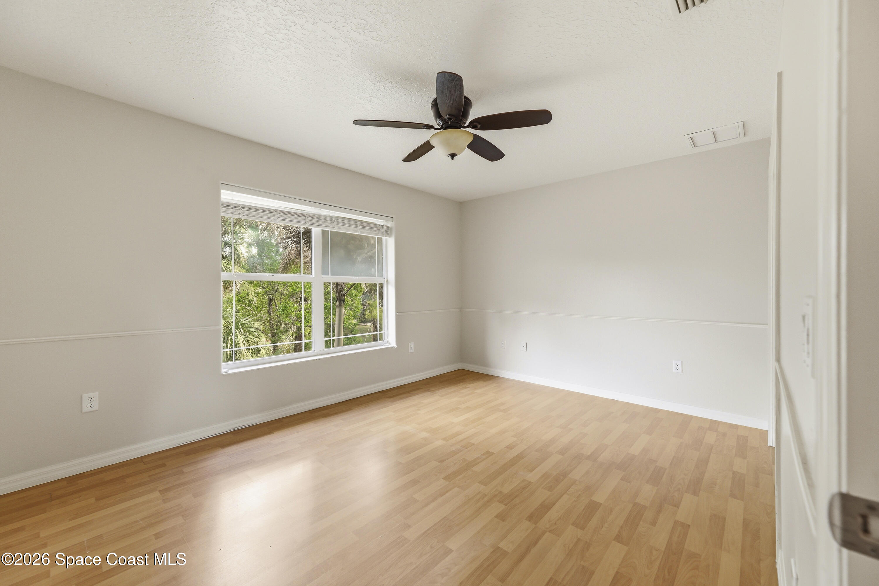 2300 Duncil Lane Malabar, FL 32950 - Photo 44 of 86 a view of an empty room with a window