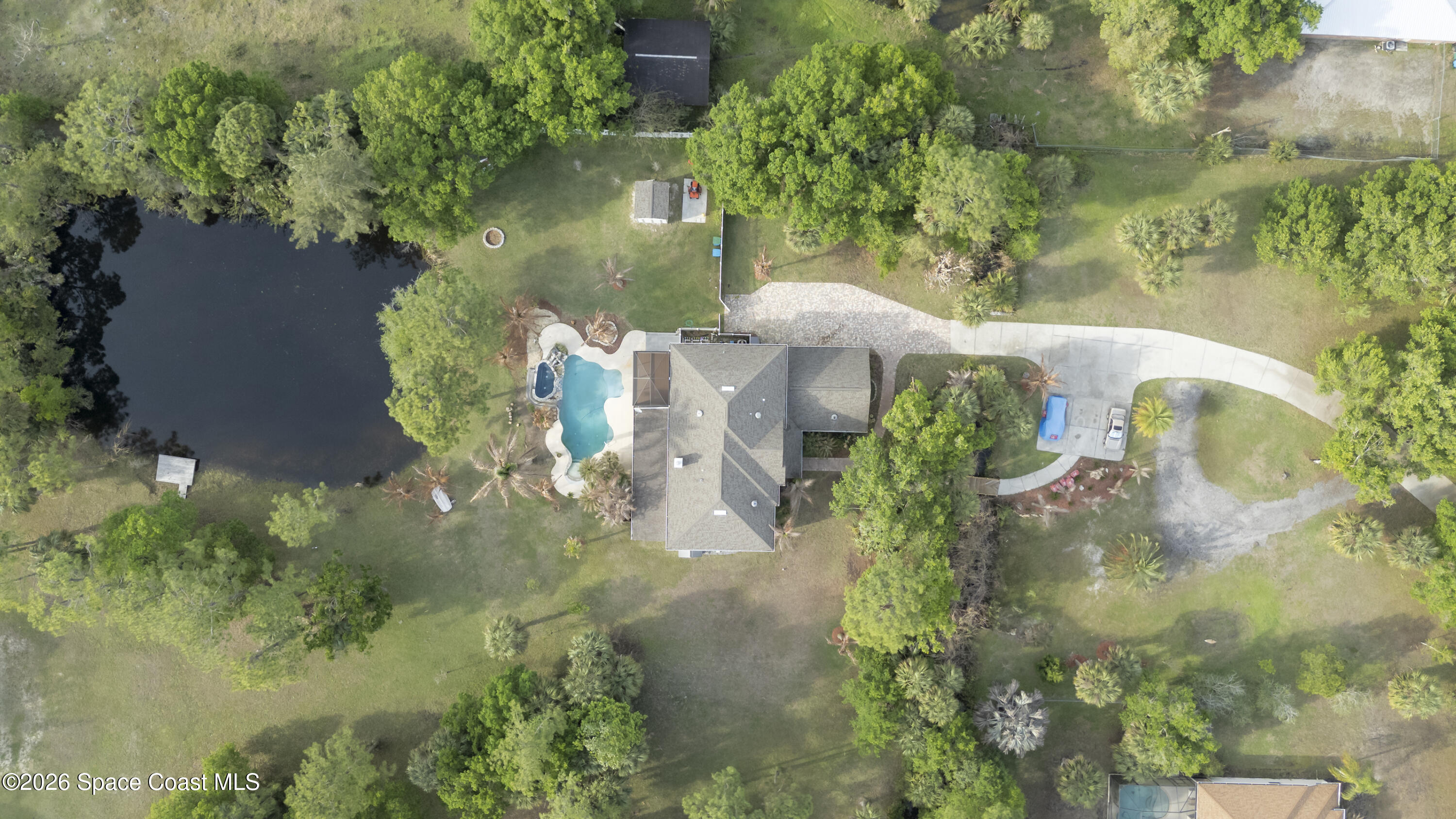 2300 Duncil Lane Malabar, FL 32950 - Photo 71 of 86 an aerial view of a house with a yard