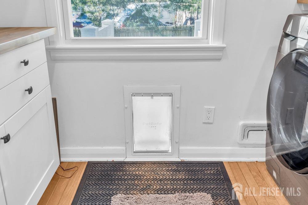 110 Springcrest Drive Hightstown, NJ 08520 - Photo 13 of 44 a view of a room that has a window and wooden floor