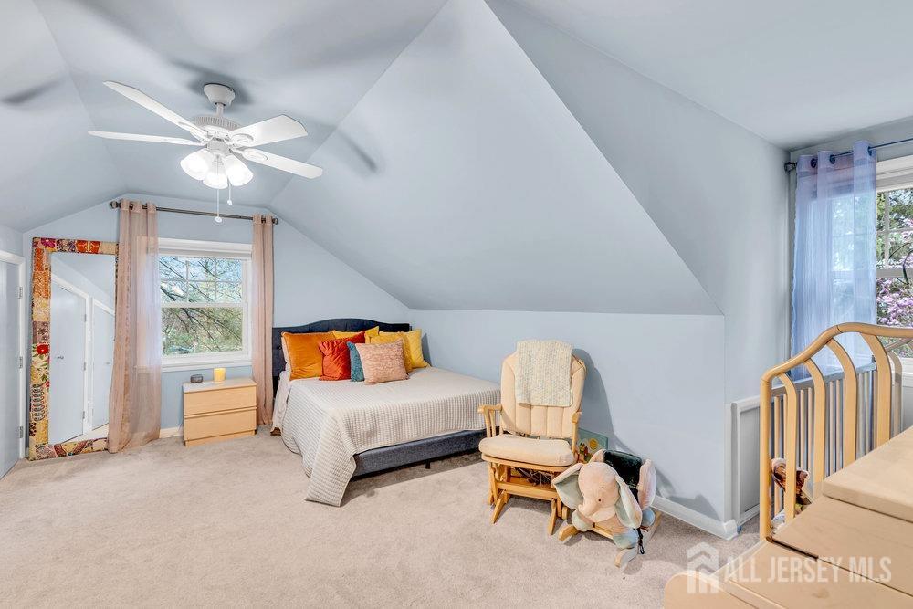 110 Springcrest Drive Hightstown, NJ 08520 - Photo 19 of 44 a bedroom with furniture and a window