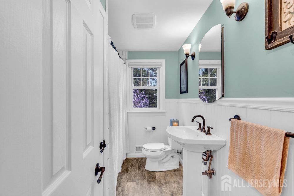 110 Springcrest Drive Hightstown, NJ 08520 - Photo 20 of 44 a bathroom with a sink toilet and shower