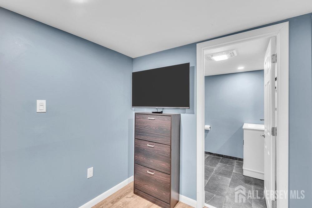 110 Springcrest Drive Hightstown, NJ 08520 - Photo 27 of 44 wooden floor in an empty room