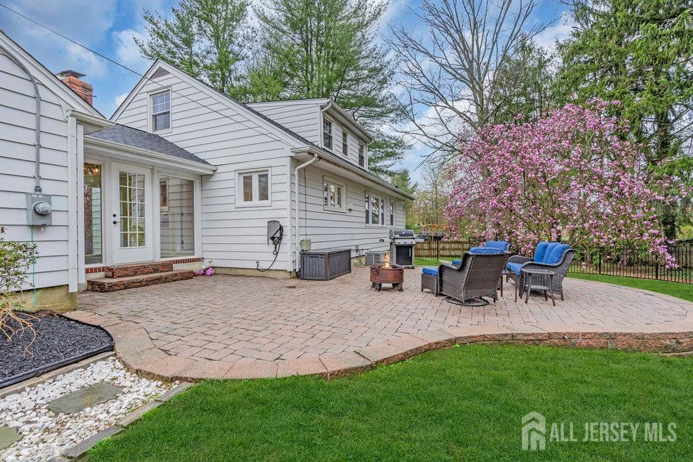 110 Springcrest Drive Hightstown, NJ 08520 - Photo 33 of 44 a view of a house with backyard and sitting area