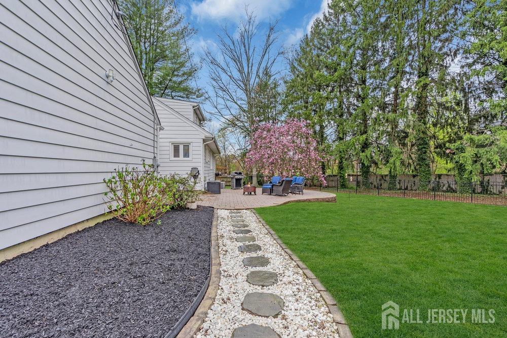 110 Springcrest Drive Hightstown, NJ 08520 - Photo 35 of 44 a front view of a house with garden