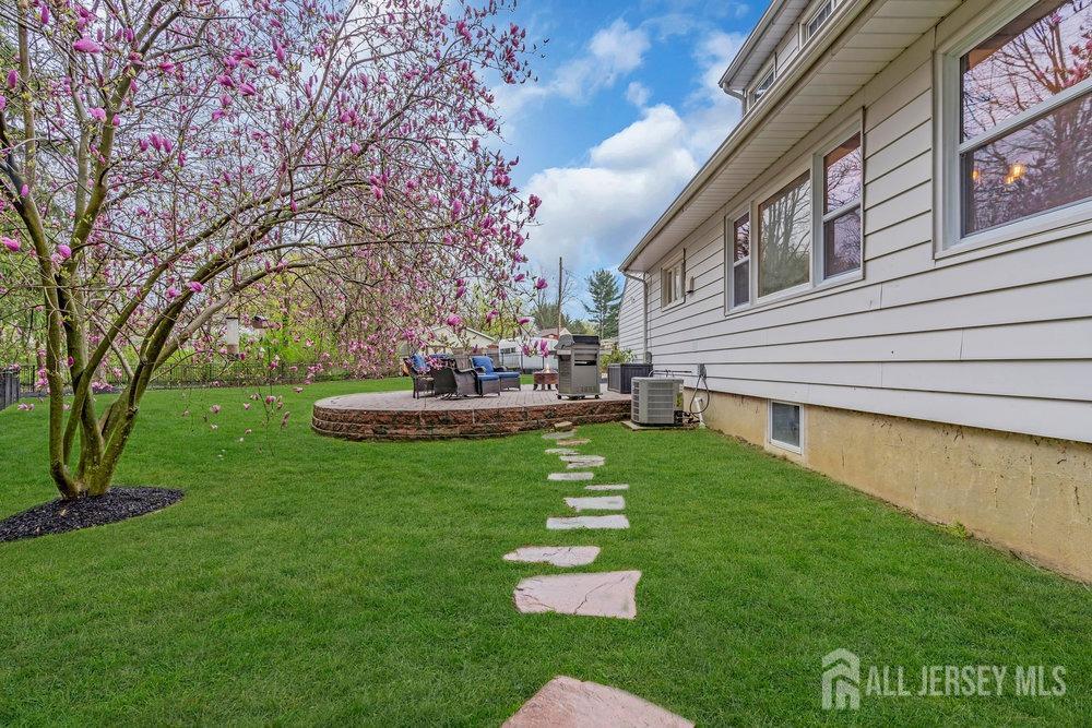 110 Springcrest Drive Hightstown, NJ 08520 - Photo 38 of 44 a garden view with a seating space