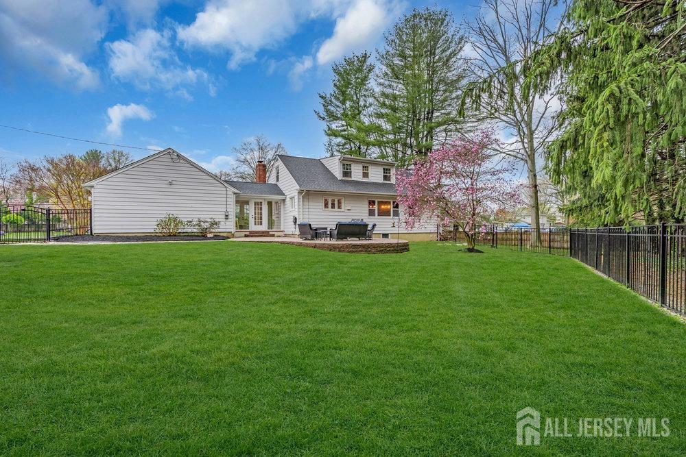 110 Springcrest Drive Hightstown, NJ 08520 - Photo 39 of 44 a front view of a house with garden