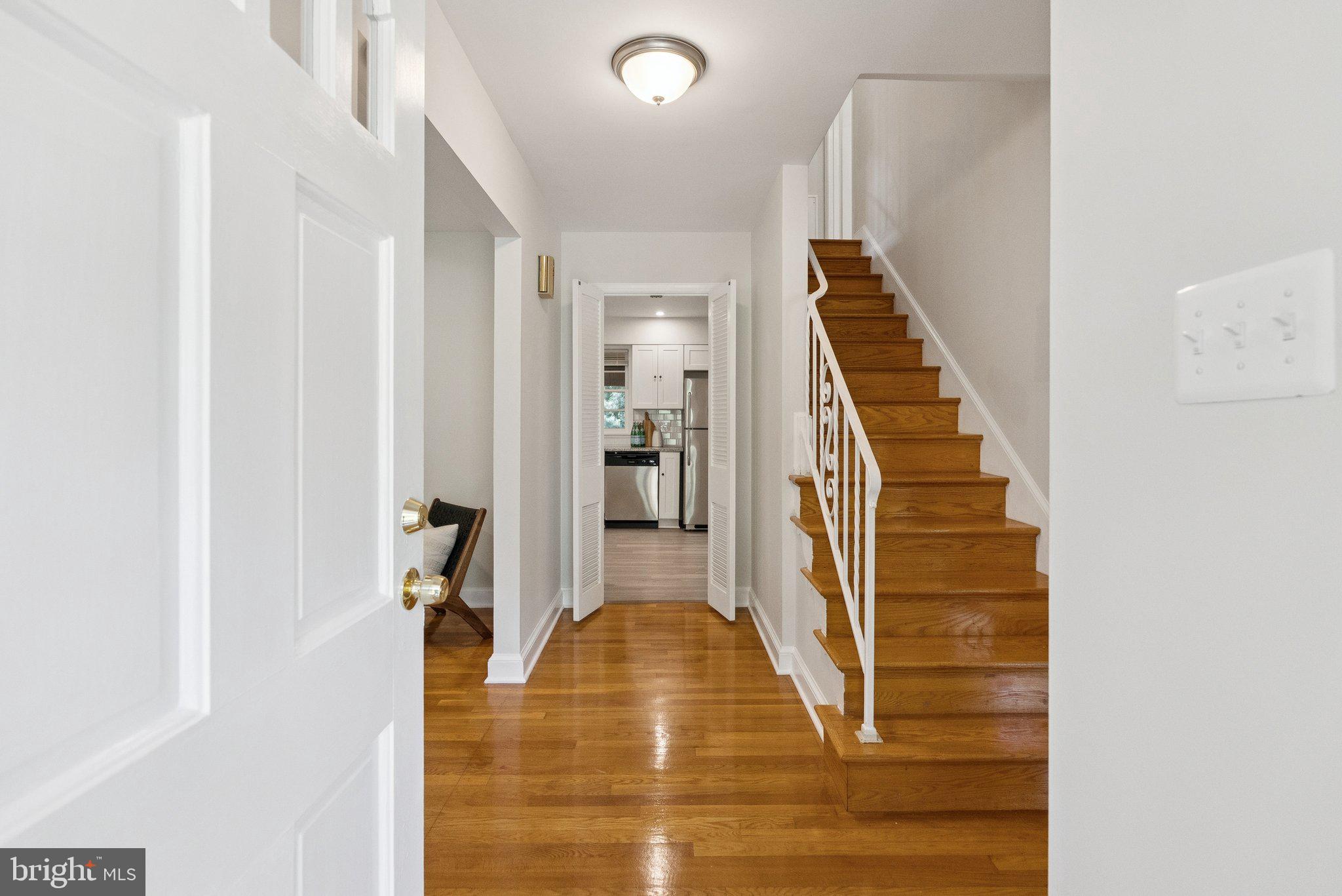 111 Marine Terrace Silver Spring, MD 20905 - Photo 3 of 40 a view of entryway and hall with wooden floor