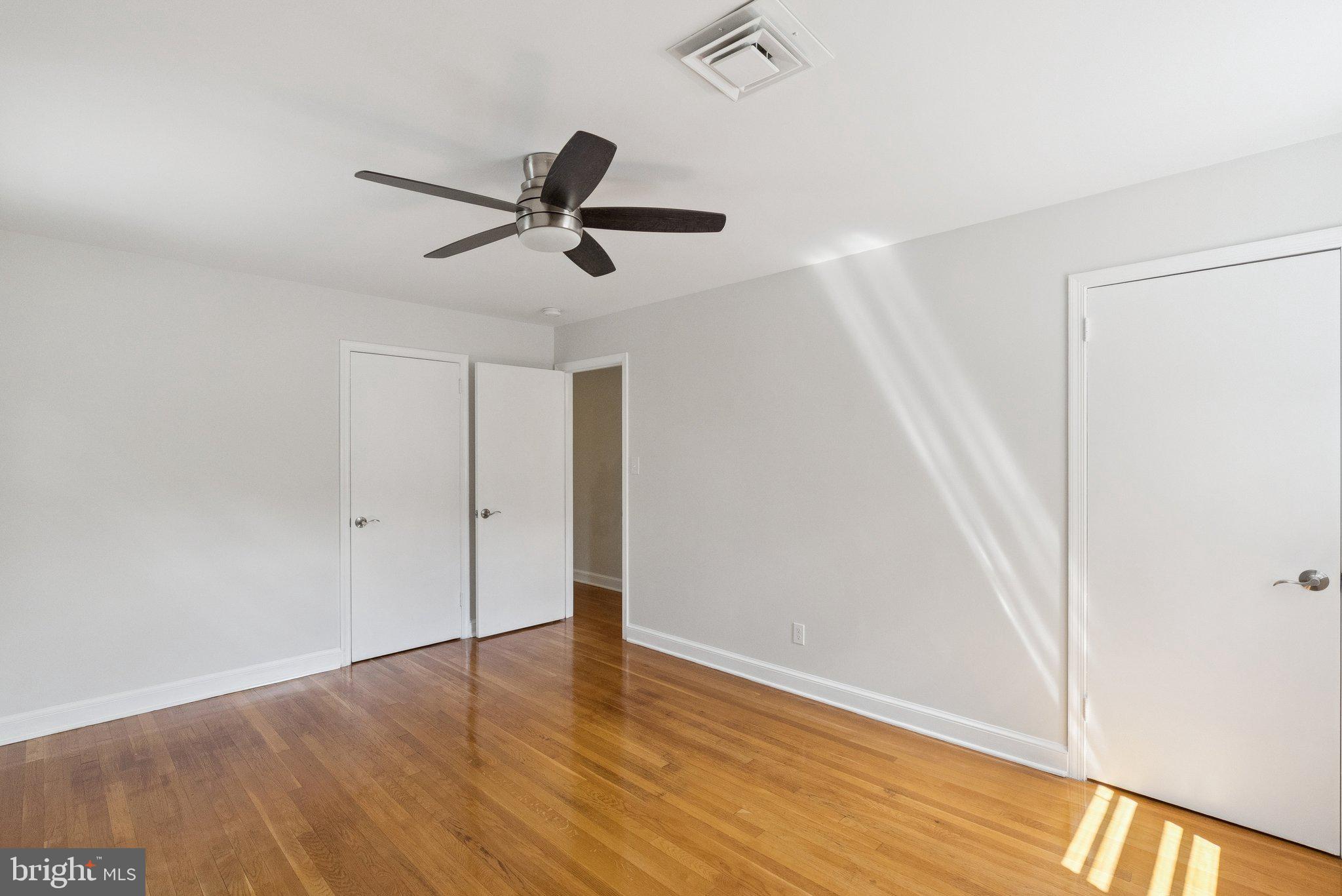 111 Marine Terrace Silver Spring, MD 20905 - Photo 31 of 40 a view of empty room with wooden floor