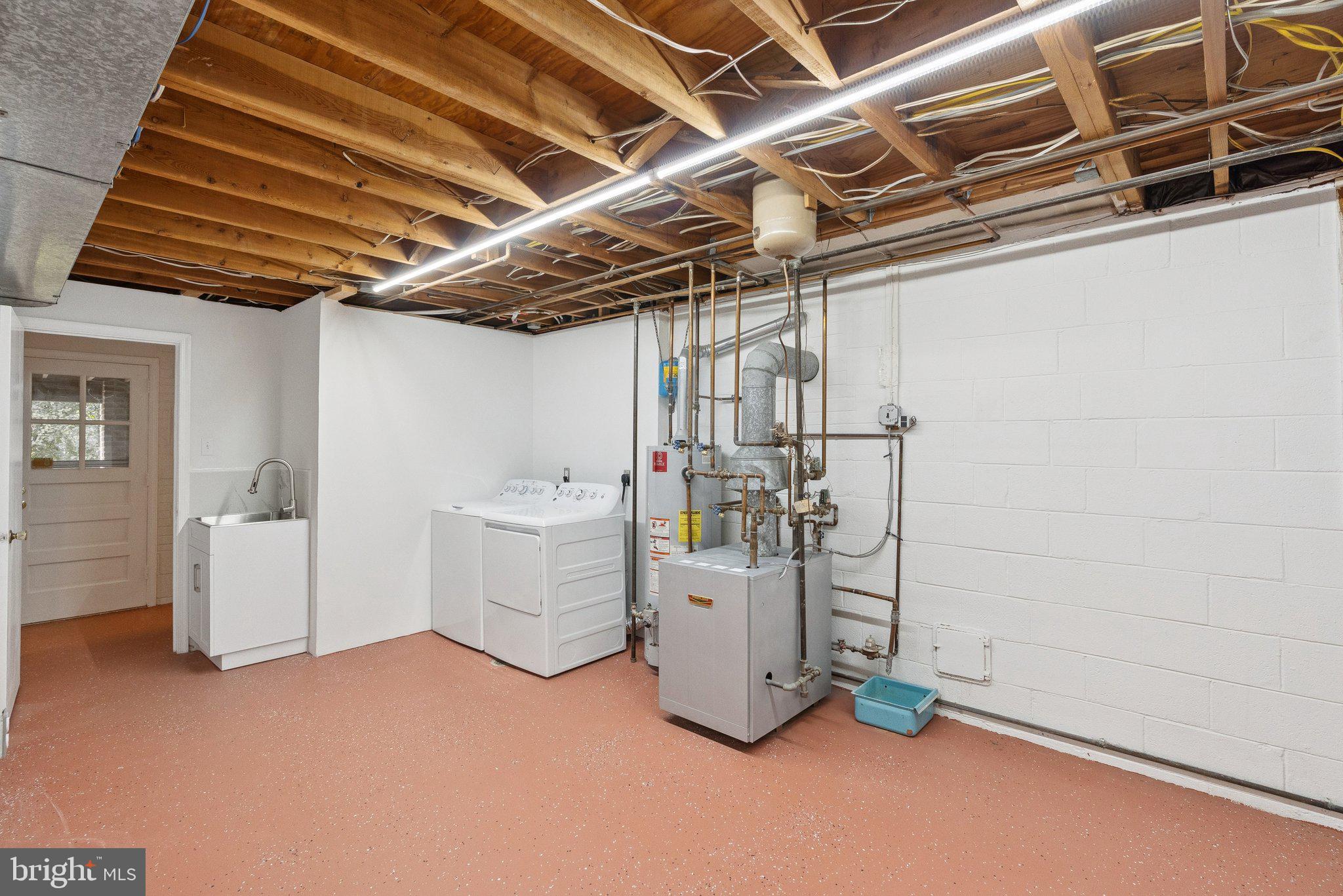 111 Marine Terrace Silver Spring, MD 20905 - Photo 37 of 40 a view of a storage & utility room with racks