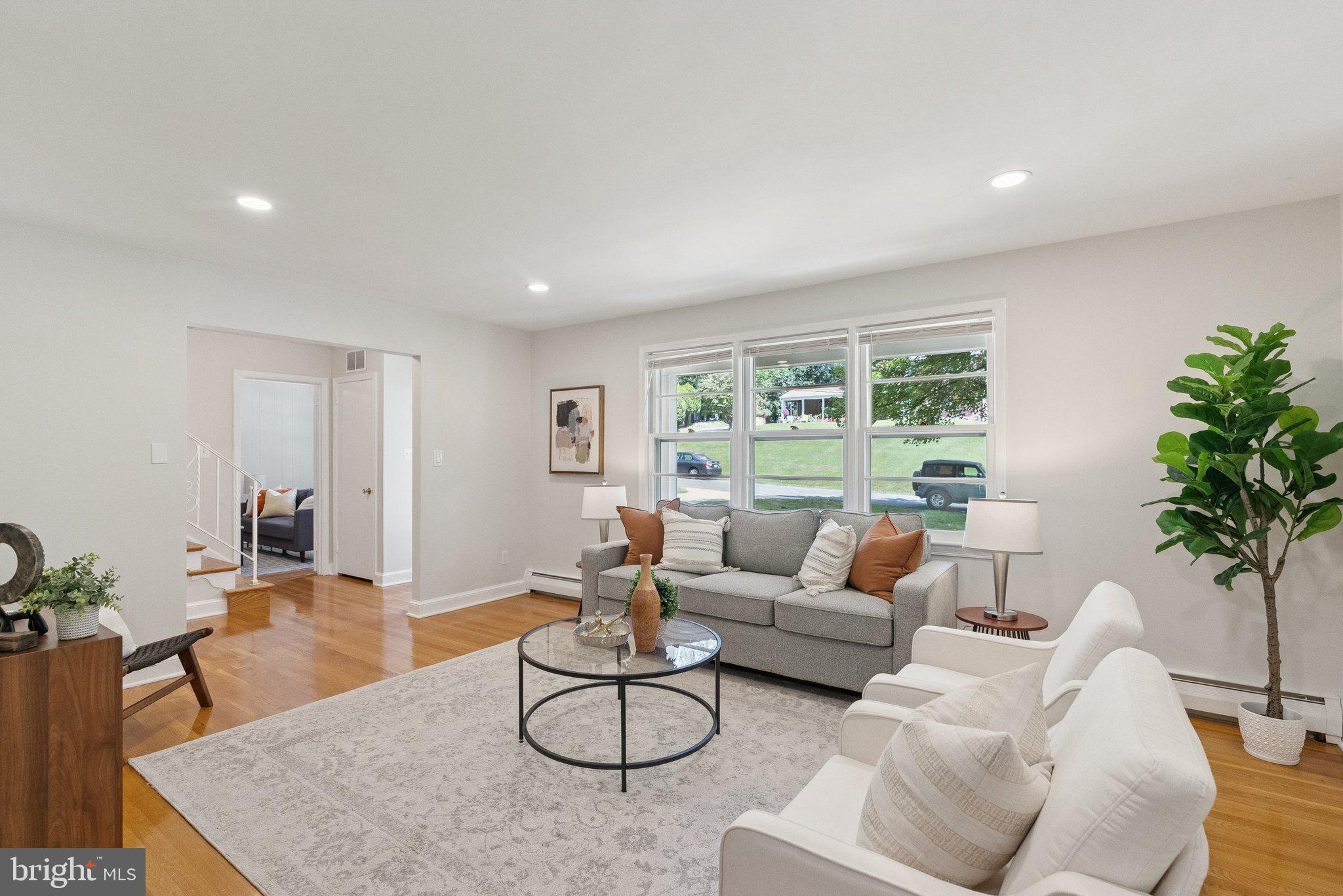 111 Marine Terrace Silver Spring, MD 20905 - Photo 4 of 40 a living room with furniture and a large window