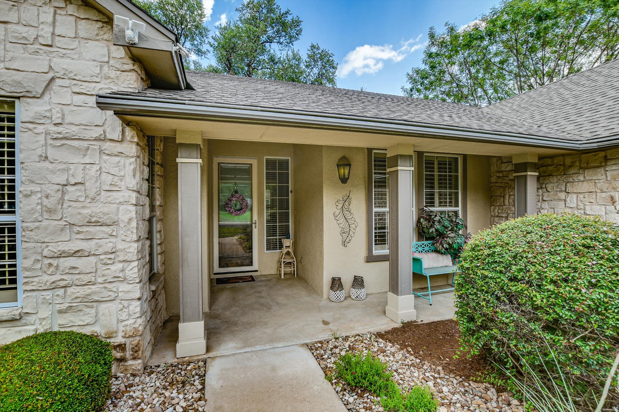 106 Nighthawk Way Georgetown, TX 78633 - Photo 3 of 29 A welcoming stone facade and covered entry offer inviting curb appeal.