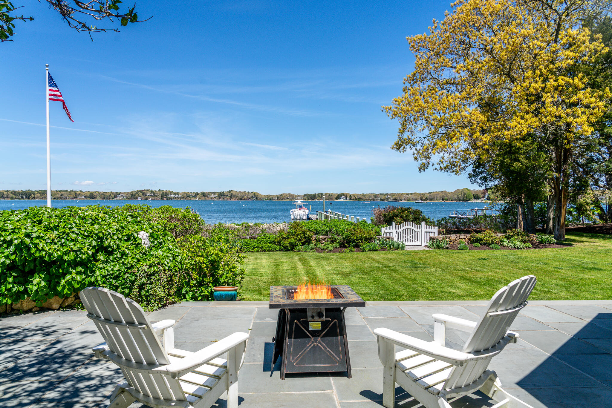 46 Great Bay Road Osterville, MA 02655 - Photo 2 of 54 a view of a patio with a table and chairs