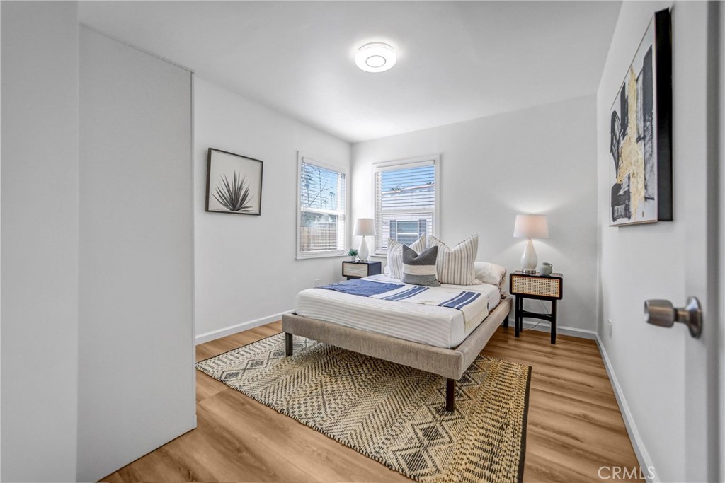 1925 Lundy Avenue Pasadena, CA 91104 - Photo 16 of 47 a bedroom with a bed and a table