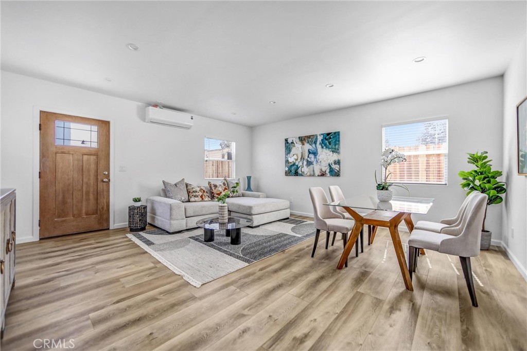 1925 Lundy Avenue Pasadena, CA 91104 - Photo 28 of 47 a living room with furniture and a wooden floor