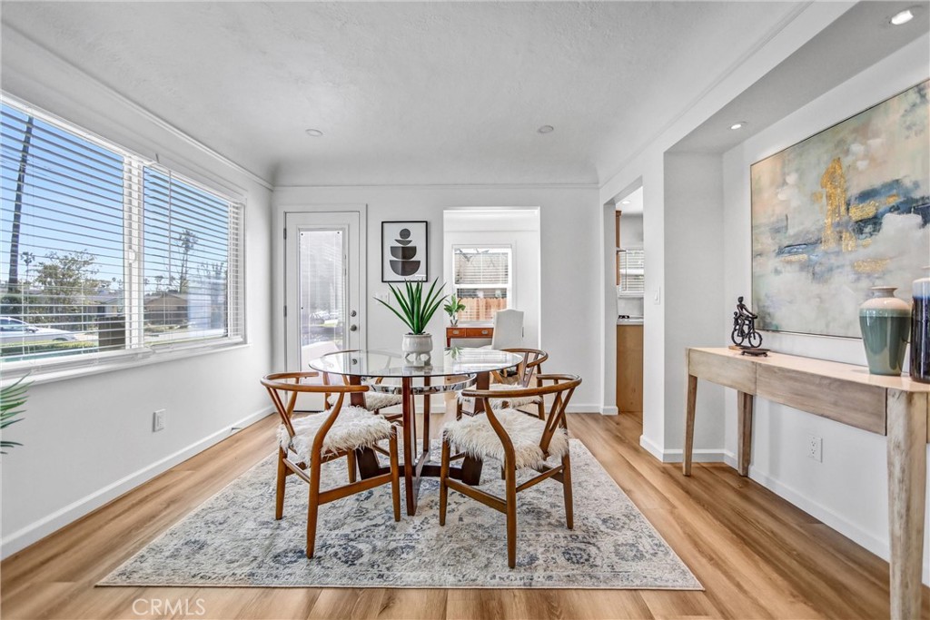 1925 Lundy Avenue Pasadena, CA 91104 - Photo 9 of 47 a view of a dining room with furniture window and wooden floor