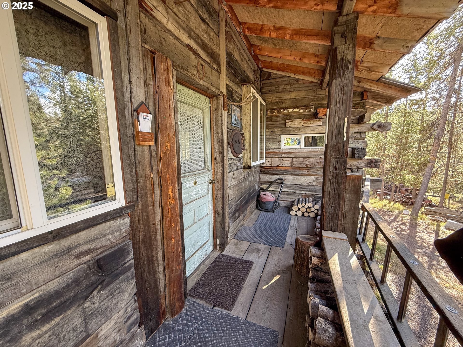 0 North Sumpter, OR 97877 - Photo 37 of 41 a view of a balcony with furniture and a floor to ceiling window