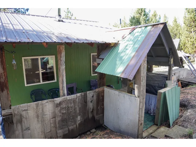 a view of a house with a porch