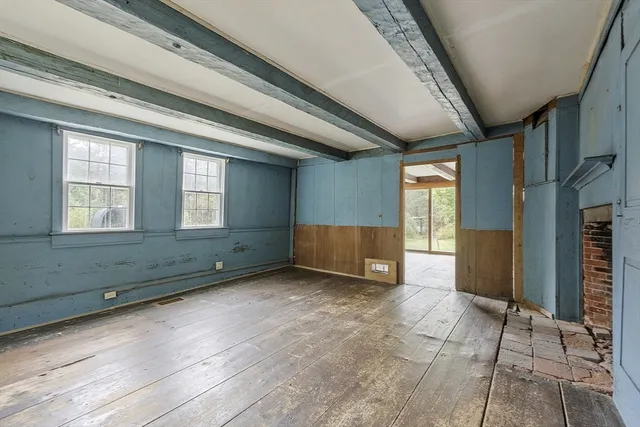 a view of an empty room and window