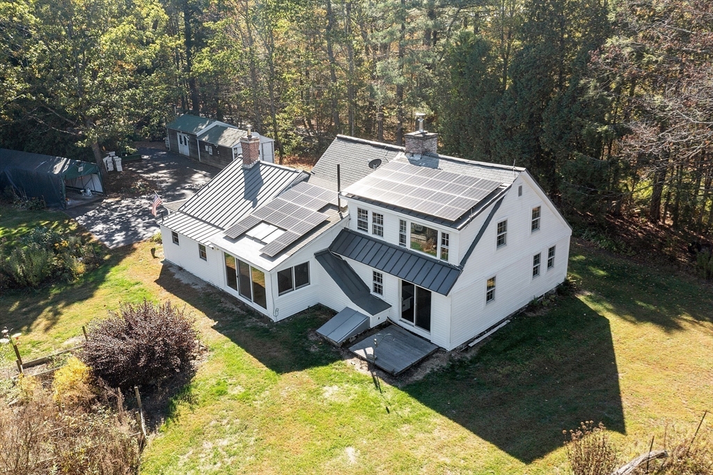 350 Athol-Richmond Road Royalston, MA 01368 - Photo 3 of 40 a view of a house with roof yard and sitting area