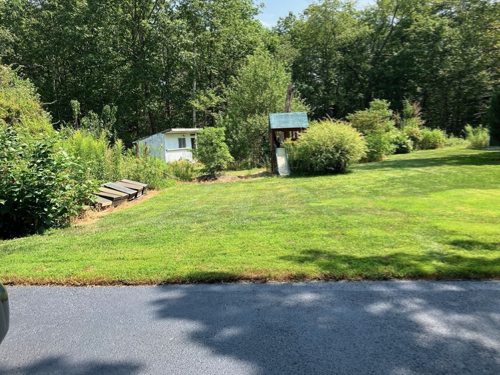 350 Athol-Richmond Road Royalston, MA 01368 - Photo 34 of 40 a front view of a house with a yard and trees
