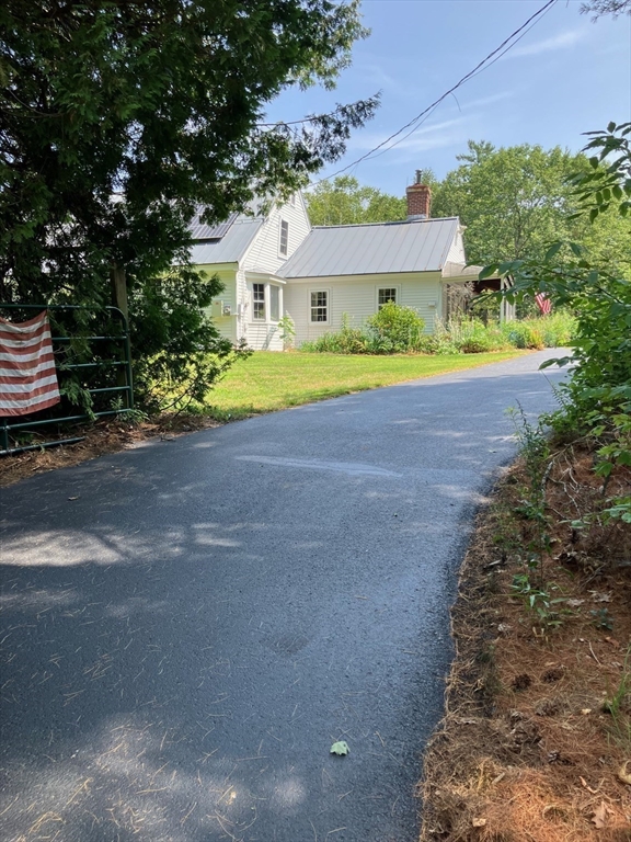 350 Athol-Richmond Road Royalston, MA 01368 - Photo 5 of 40 a house with swimming pool in front of it