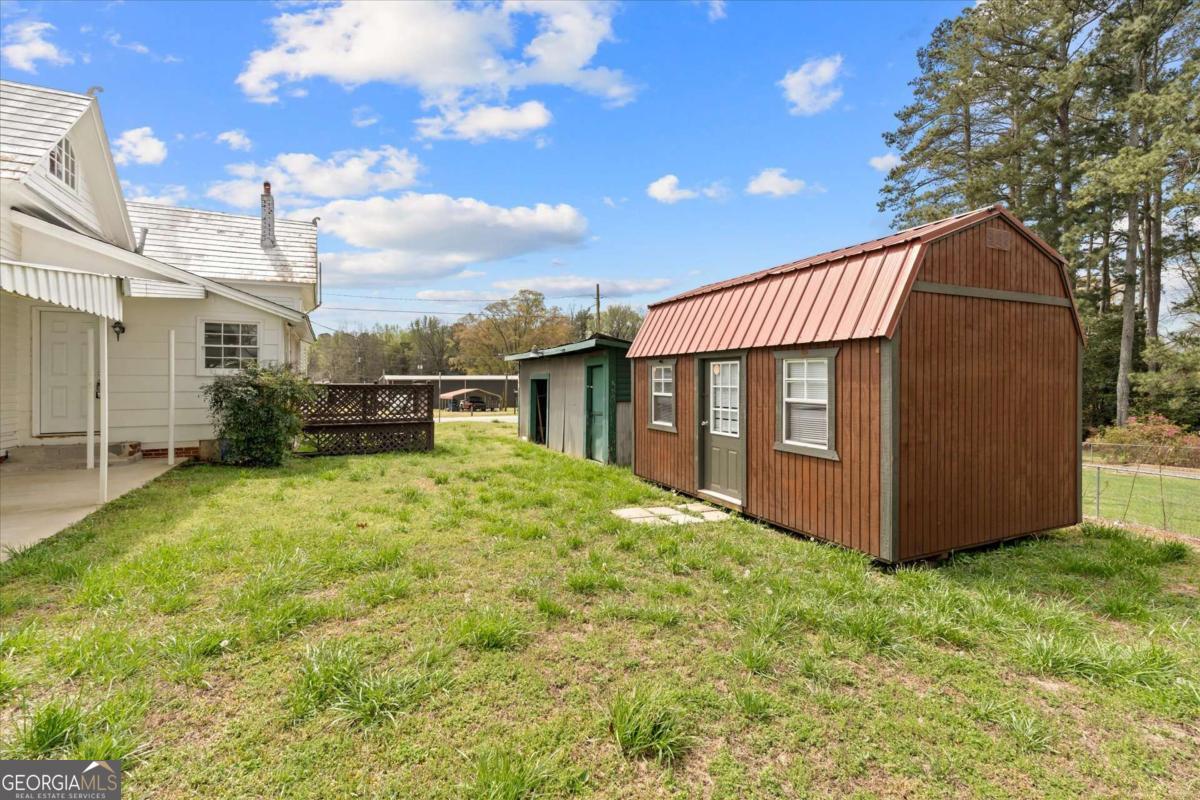 3608 Us Highway Buchanan, GA 30113 - Photo 14 of 50 a view of a house with backyard and sitting area