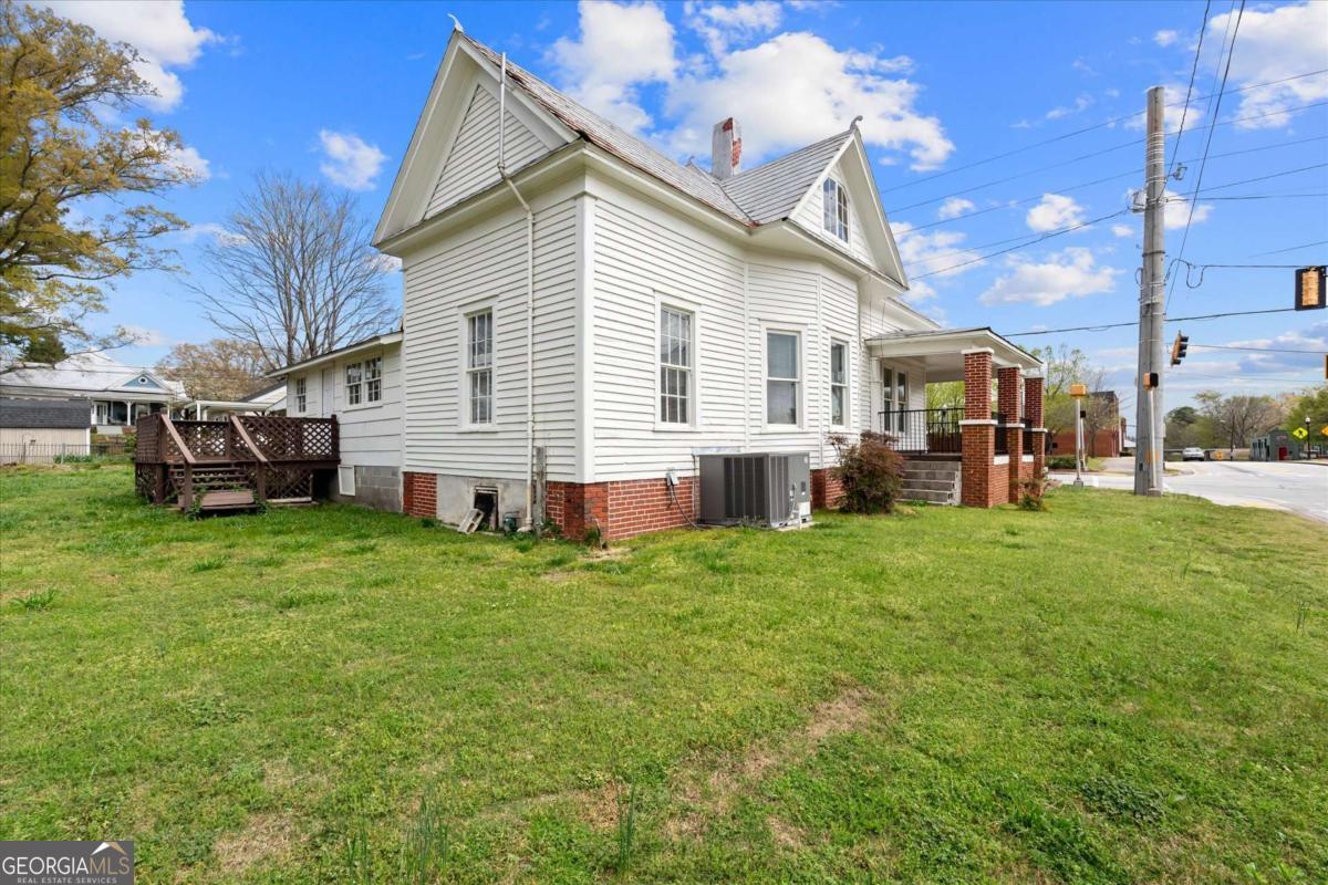 3608 Us Highway Buchanan, GA 30113 - Photo 15 of 50 a view of a house with a backyard