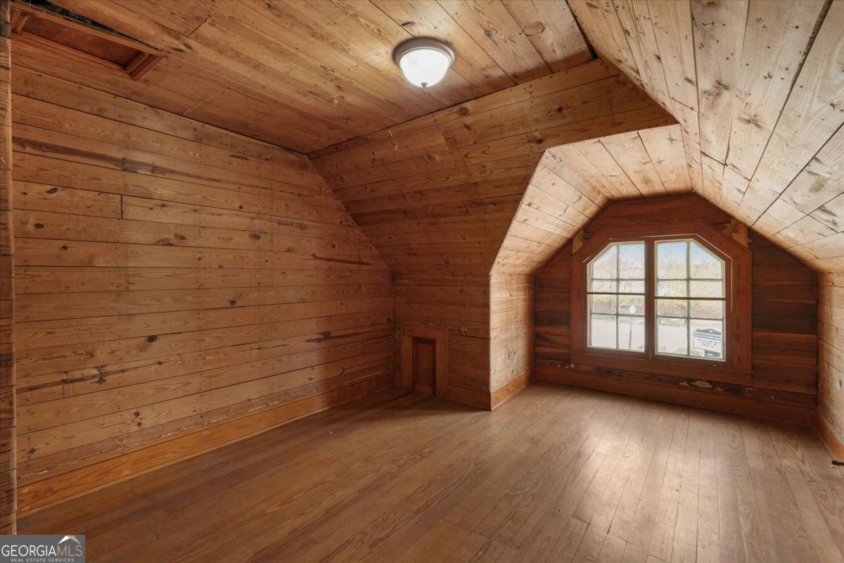 3608 Us Highway Buchanan, GA 30113 - Photo 16 of 50 wooden floor in an empty room with a window