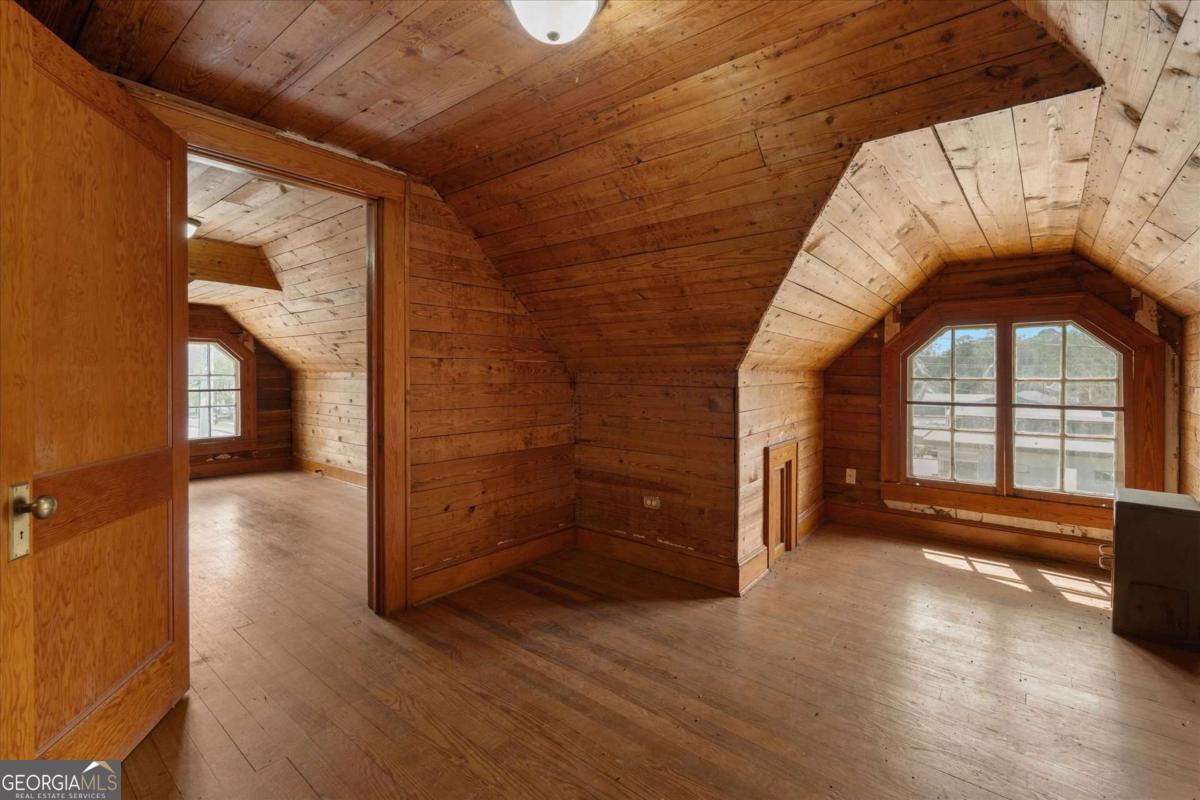 3608 Us Highway Buchanan, GA 30113 - Photo 17 of 50 an empty room with wooden floor and windows