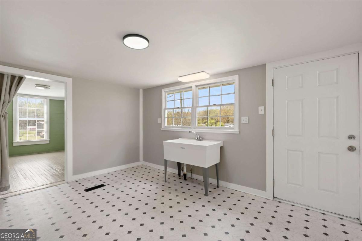 3608 Us Highway Buchanan, GA 30113 - Photo 24 of 50 a bedroom with a sink and a window