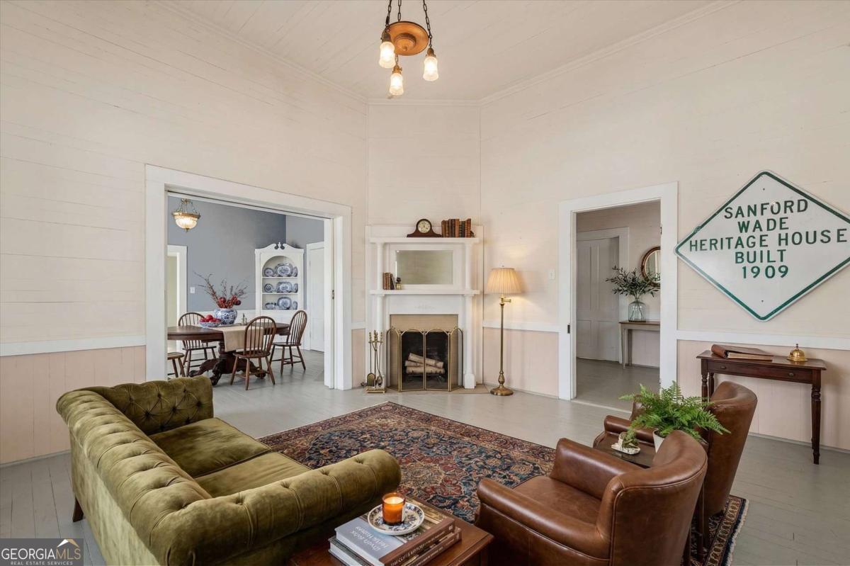3608 Us Highway Buchanan, GA 30113 - Photo 3 of 50 a living room with furniture chandelier and fireplace