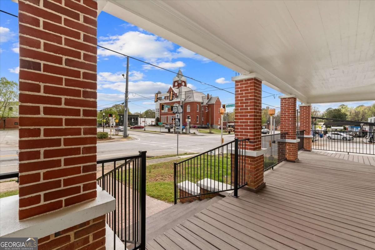 3608 Us Highway Buchanan, GA 30113 - Photo 40 of 51 a view of a balcony with many windows