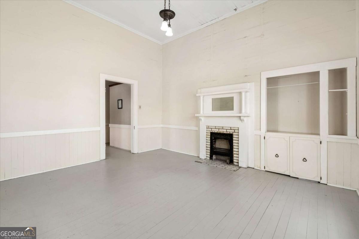 3608 Us Highway Buchanan, GA 30113 - Photo 40 of 50 an empty room with fireplace