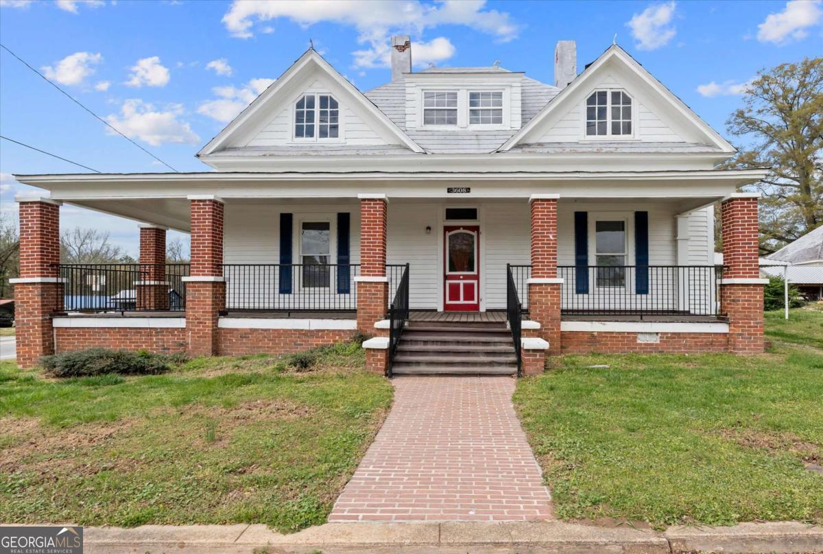 3608 Us Highway Buchanan, GA 30113 - Photo 47 of 50 a view of a big building with a big yard and large trees