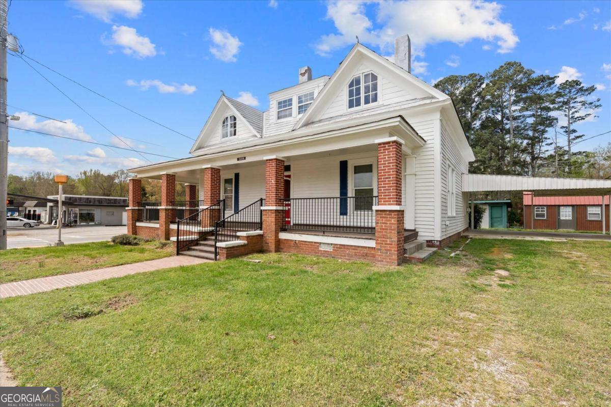 3608 Us Highway Buchanan, GA 30113 - Photo 49 of 50 a view of a house with swimming pool and sitting area