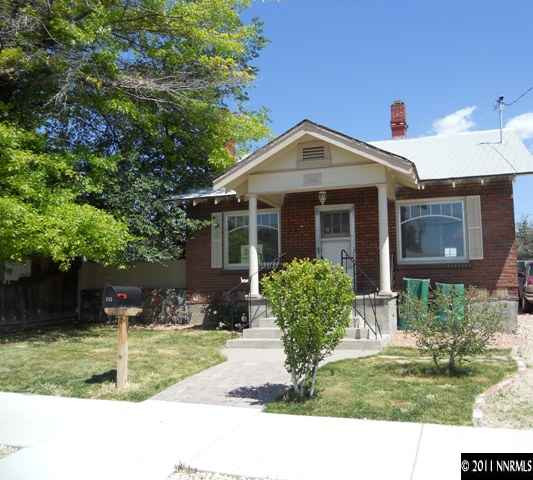 515 Burns Street, Unit B Reno, NV 89502 - Photo 1 of 9 a front view of a house with a yard