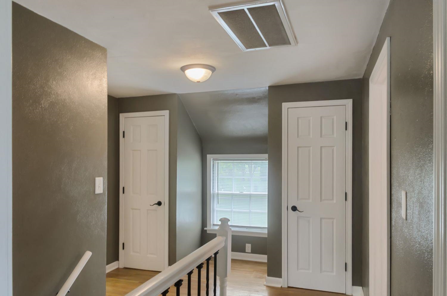 736 East 3rd Street Dixon, IL 61021 - Photo 20 of 29 a view of a hallway with wooden floor and entryway