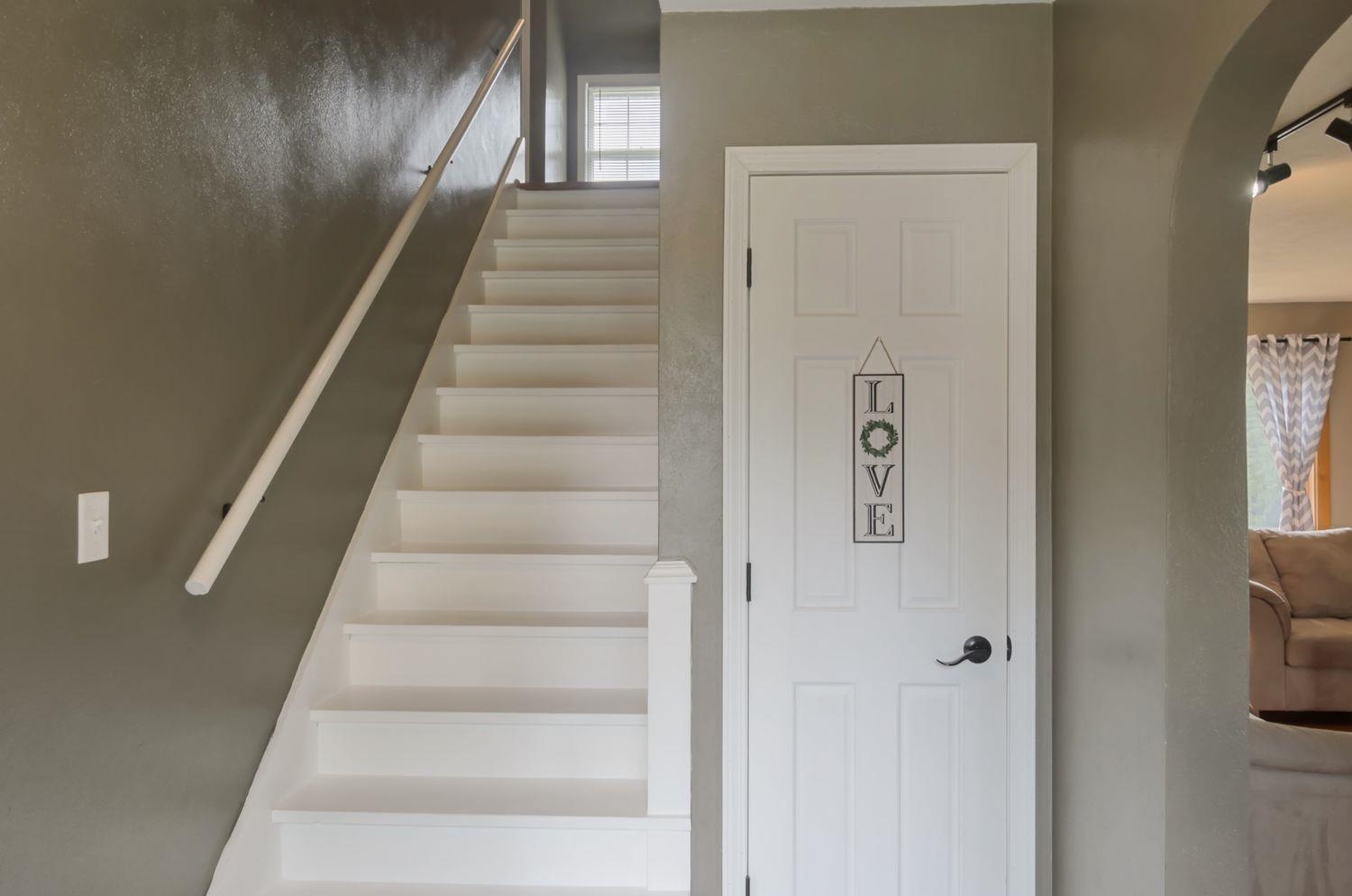 736 East 3rd Street Dixon, IL 61021 - Photo 2 of 29 a view of staircase with white walls and windows