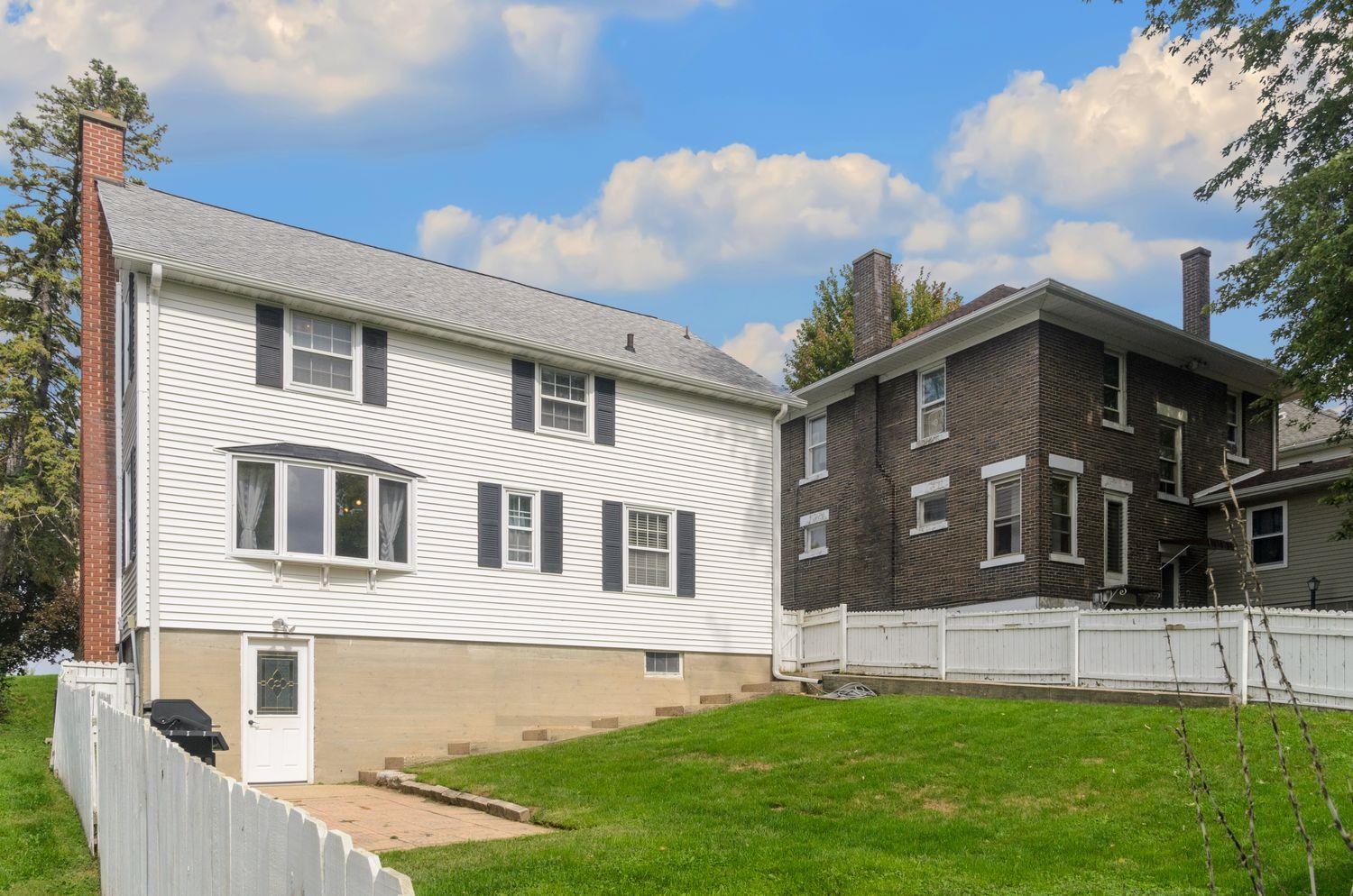 736 East 3rd Street Dixon, IL 61021 - Photo 28 of 29 a front view of a house with a yard