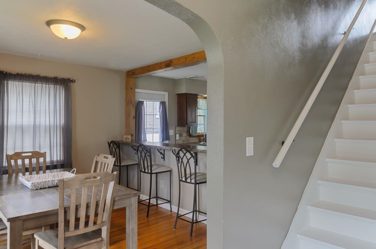 736 East 3rd Street Dixon, IL 61021 - Photo 3 of 29 a view of a dining room with furniture and wooden floor